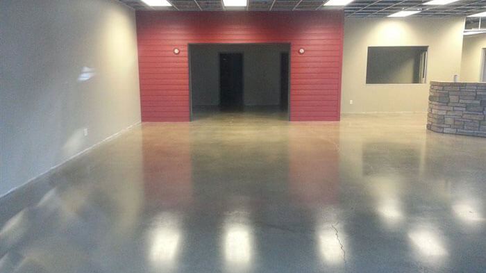 concrete floor with red wall.